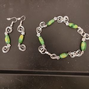 Handcrafted glass bead and silver bracelet and ear
